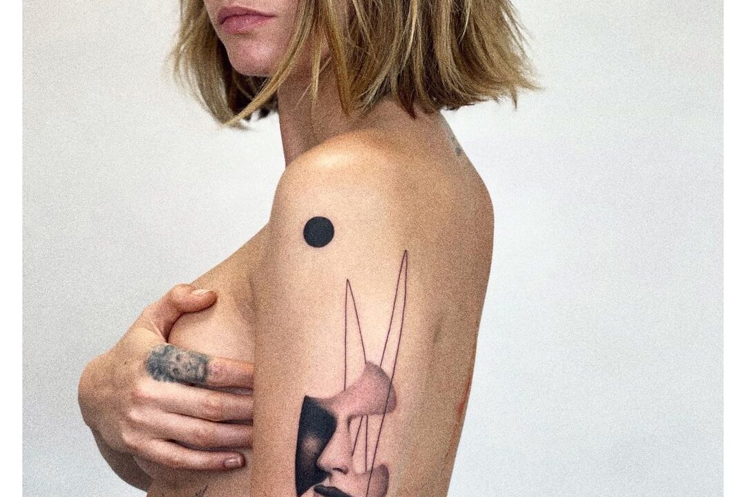 Cara Delevingne Defends Posing Topless to Showcase New Arm Tattoo