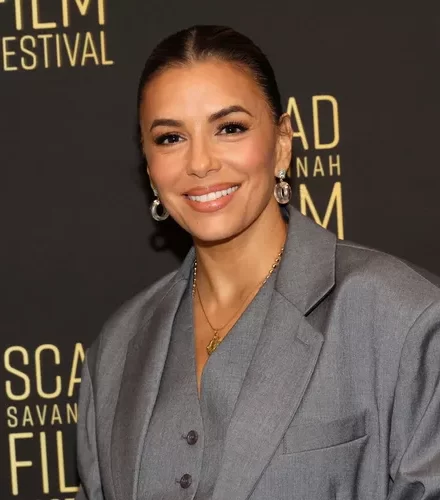 Eva Longoria Elevates the Slouchy Suit into a Polished Groufit Ensemble